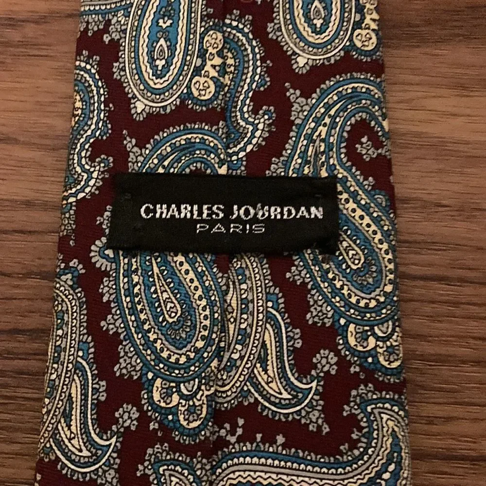 Charles Jordan Paris Silk Skinny Tie in Paisley Print with Burgundy Background.